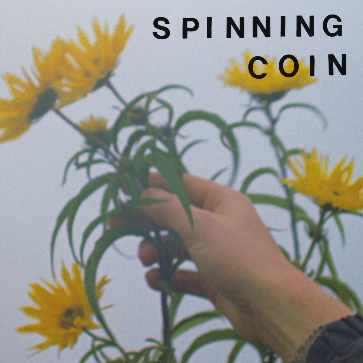 Afbeelding van Spinning Coin - Raining On Hope Street